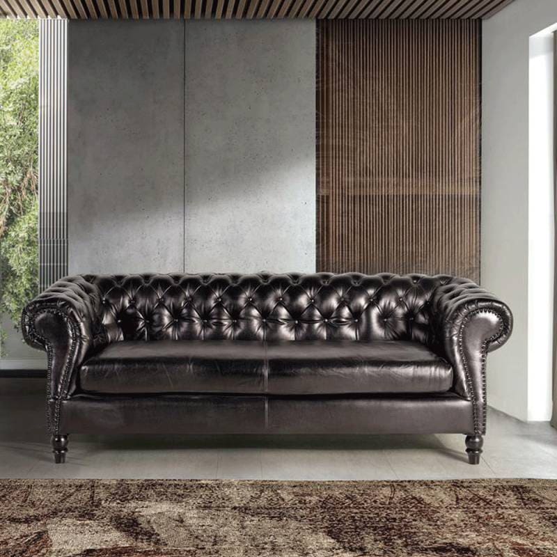 Sofá Chester 3 plazas tapizado en piel negra de vacuno.